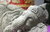 Steinfigur Ganesha liegend mit schöner Patina